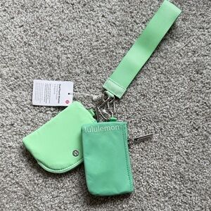 Lululemon new green dual pouch wristlet